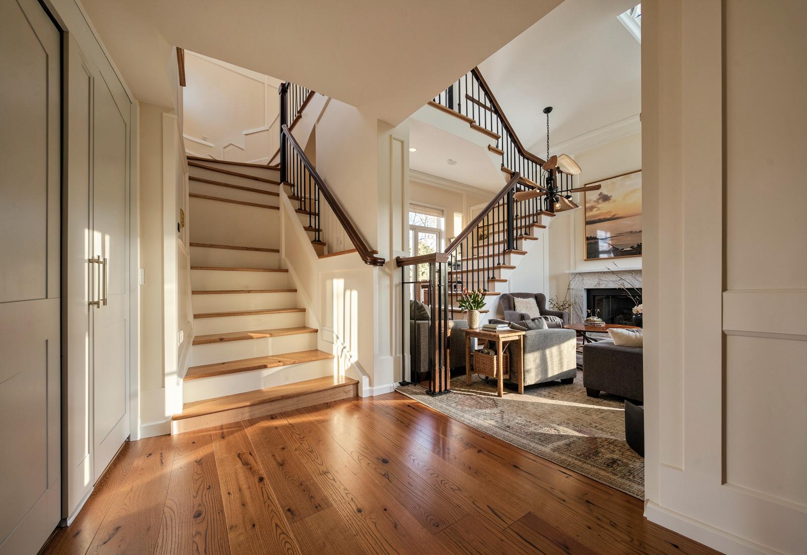 Hardwood entryway and stair landing in an Ottawa home